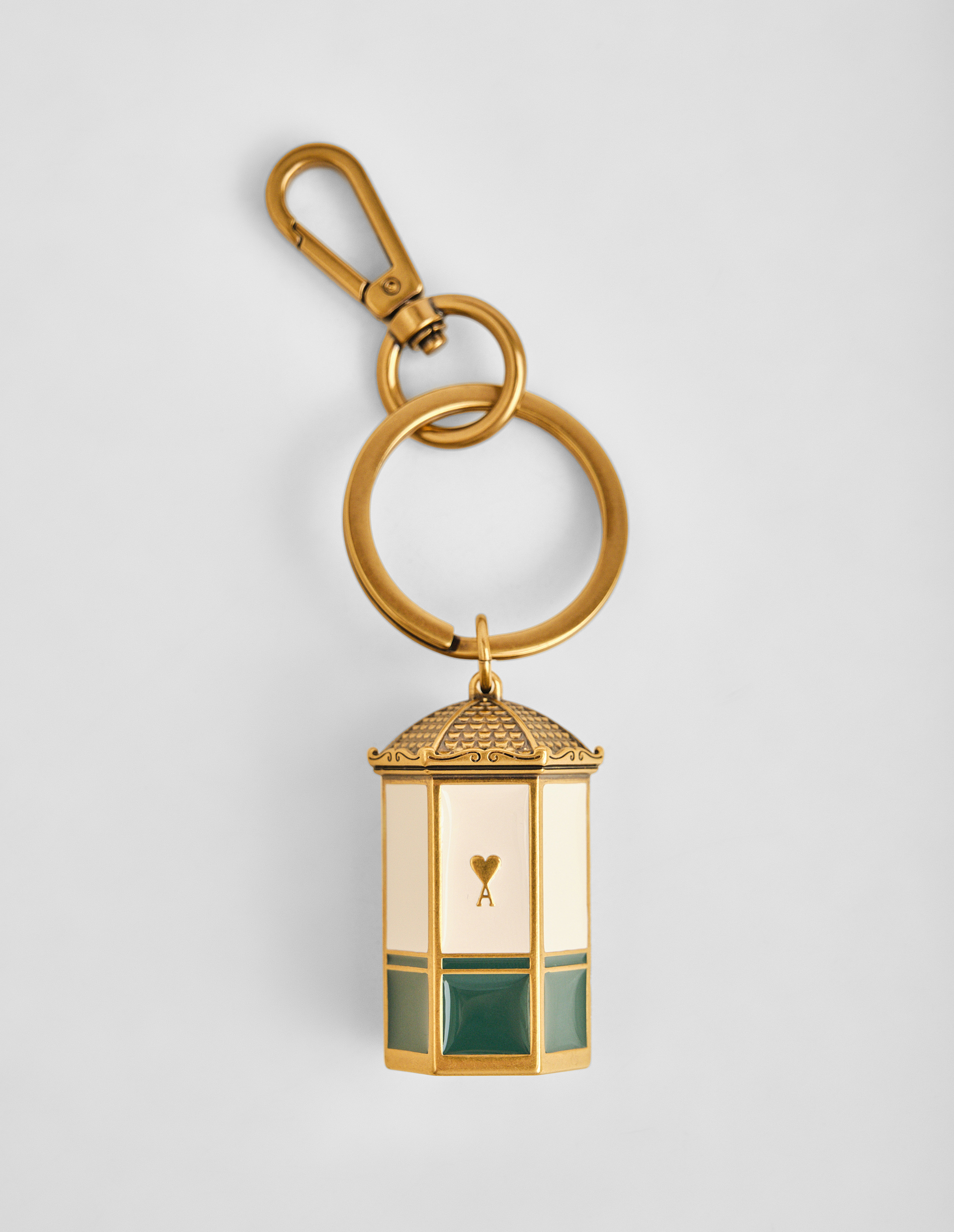 Золотистый брелок в подвеской в виде Парижского киоска Ami de Coeur Keyring ami